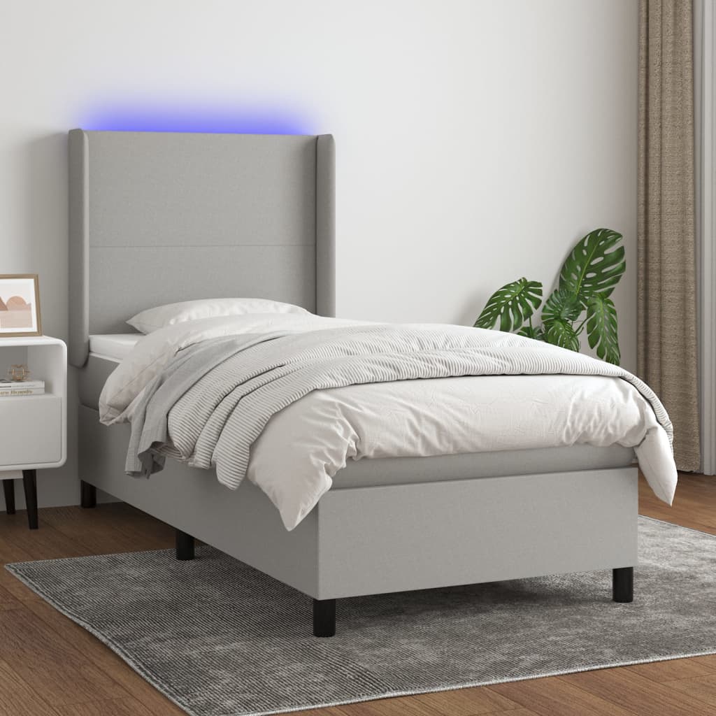 Világosszürke szövet rugós és LED-es ágy matraccal 90x190 cm
