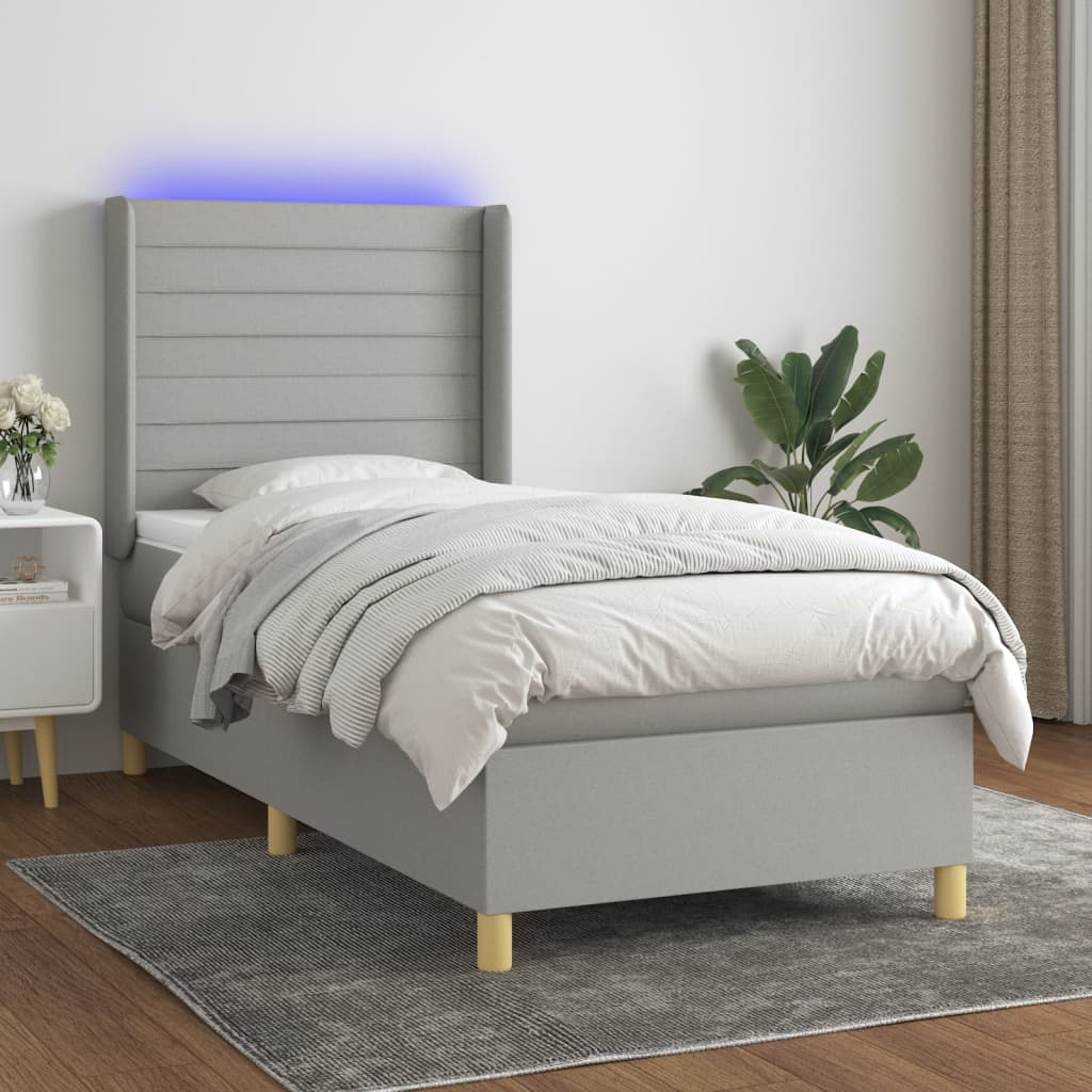 Világosszürke szövet rugós és LED-es ágy matraccal 90x190 cm