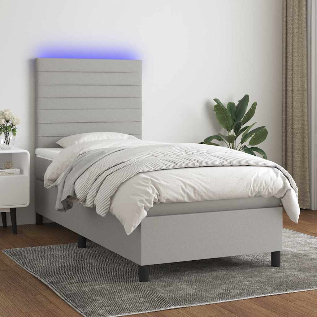 Világosszürke szövet rugós és LED-es ágy matraccal 90x190 cm