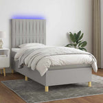 Világosszürke szövet rugós és LED-es ágy matraccal 90x190 cm