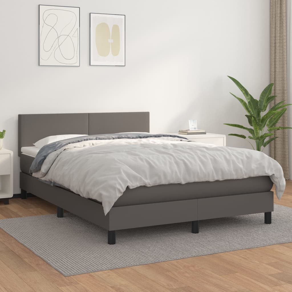 Szürke műbőr rugós ágy matraccal 140x190 cm
